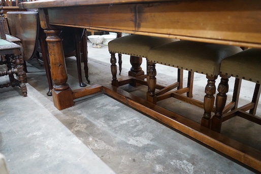 An 18th century style rectangular pine refectory dining table, length 198cm, depth 94cm, height 77cm